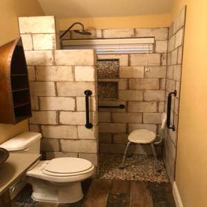 Photos by Vip Services #2 Demos existing tub/shower and convert into handicap bathroom. Created and built an sink and cabinet to go with the rustic...