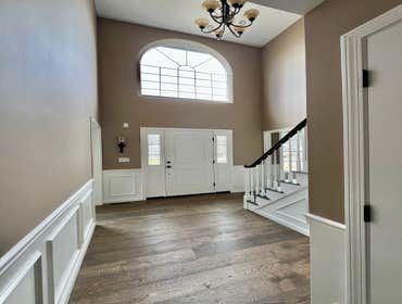 Photos by Lightship Development LLC #1 Complete remodel due to flood. Reconfigured master bathroom floor plan to accommodate over sized walk in shower.