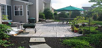 Patio in Altoona Stone patio and fireplace