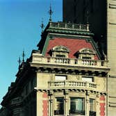 Benjamin Duke House Reproduction of the forged iron finials and copper balustrade atop the mansard roof.
