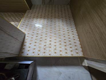 Photos by MC ALISTER TILE #1 5 showers total, was hired after another handyman did not water proof correctly, fixed all water proofing and installed 