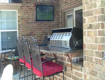 Cedar Garage Door and Backyard Kitchen