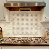 Wedgwood Kitchen Blue Sound Construction, Inc. updated this Wedgwood kitchen with some re-framing, all new cabinets, flooring, Calcutta Gold (marble) t