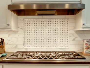 Wedgwood Kitchen Blue Sound Construction, Inc. updated this Wedgwood kitchen with some re-framing, all new cabinets, flooring, Calcutta Gold (marble) t