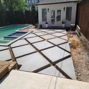 Photos by Alexsander Deoliveira Franca #1 multi-colored river rock new concrete walk way with wood bridge