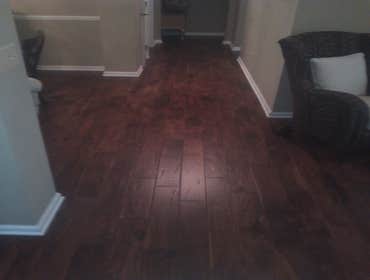 hardwood floor This project consisted of demolition of 500 sq ft of tile, 500 sq ft carpet. The slab required extensive floor prep to meet manufacture