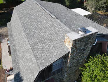 Photos by Tactical Construction Group LLC #1 Remove and reinstall a new shingle roof, tapered flat roof, and demo solar pool heaters and solar water he
