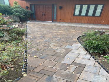 Photos by Steve Danylko Land Service #1 New lawn and landscaping