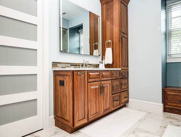 Primary Bathroom & Closet Client wanted to remodel their primary bathroom. We included jack and jill vanities, a free standing tub, and a steam shower,