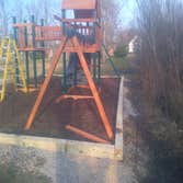 Playground installation ( Leveling & Grading & Building support for play area) Playground Installation which involved leveling and grading of land with