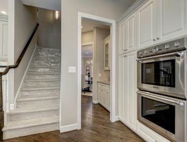 GULICK | CUSTOM Home in McLean The impressive stone and HardiePlank® elevation on our Winthrop really stood out on this corner lot of approximately one