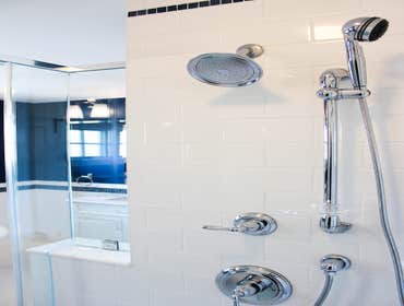 Baine Contracting Inc Project Multiple jobsites - showing kitchens, interior and exterior trim work, new homes, bathrooms, tile work, wood and iron ra