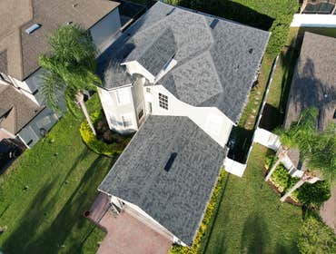 Photos by WOODSTONE ROOFING