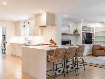 Photos by Albrecht, LLC #1 Through strategic space planning, thoughtful material selections, and custom craftsmanship, this first-floor renovation tran
