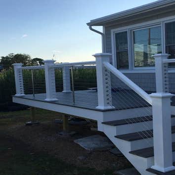 Photos by Malinowski Construction #1 These are some of the decks we have done from simple pressure treated decks to elaborate composite and cable raili