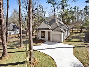 Photo(s) from Jenkins Homes, Inc. This home in Madisonville, LA is a 3 bedroom, 2 bath home with interior features that include granite in the kitchen,