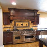 Upland Kitchen Remodel In this gorgeous kitchen remodel we included a huge buffet wall in our design, opposite the main kitchen area, and a nice mobile