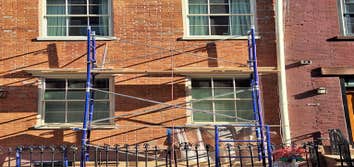 Photos by Prestige Construction #2 Brick Pointing and Installation:We specialize in brick pointing and installation, meticulously replicating the color
