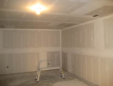 Project photos from Mueller Drywall & Construction These were pictures of a Customers Finished Basement.Was a Log Cabin Home, 75 pieces of 4x12 drywall