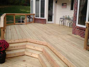 Skaer Project The clients were looking for a large deck to be able to entertain family and friends on. They wanted it to provide easy access to the poo