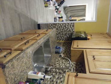 Photos by Pineiro Contracting & Property Management Services (Complete Gut/Remodel Renovation of a Modular Home The hose was in pretty bad shape when w