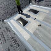 Photos by Housetop Roofing Inc #3 Re-Roof Dimensional Shingles and install skylights