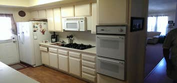 Becerra Kitchen Paint & Kitchen remodel While using existing Corain counter tops.