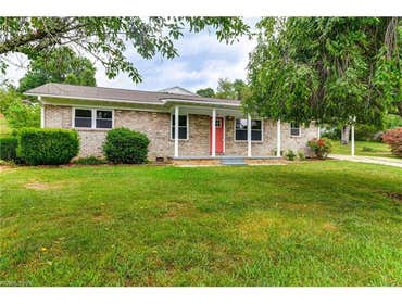 Hamburg Ln, Weaverville NC 3 bed 2 bath. Had no central heat or AC. Roof was leaking. Added square footage to create laundry room. Repaired firepla
