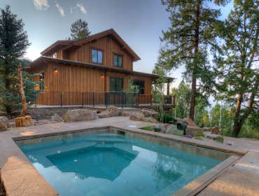 Red Sky Solar Full remodel including solar heating, hot water and hot tub. See write up at this link.
http://mechanical-hub.com/sites/hydronics/sol