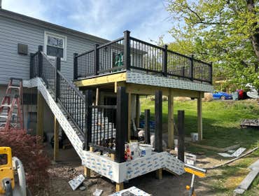 Trex "Ranier" Deck with Black Railings This Pottstown, PA Trex deck project by Merman Construction Inc. features a durable, low-maintenance outdoor liv