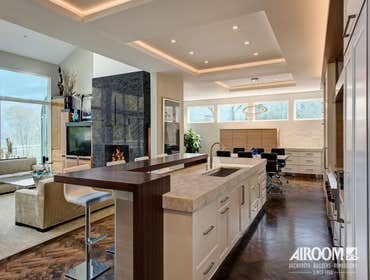 Wilmette Residential Expansion and Kitchen Remodel Expansion of an interior space by opening a bearing wall, redesign of kitchen, office and support sp