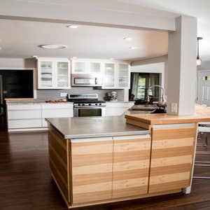 Brobst Kitchen Modern lines with horizontal hickory cabinetry, stainless steel counter tops, copper apron front sink. Blended with traditional...