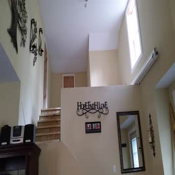 Photos by Swc Professional Services Inc #1 OPEN UPPER ATTIC AREA TO CREATE LOFT AND BEDROOM, NEW CABINETS & FLOOR IN KITCHEN, NEW WALKIN SHOWER, BEAUTI