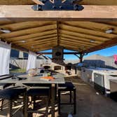 Newly Built Pergola with Built-In Kitchen and Fireplace