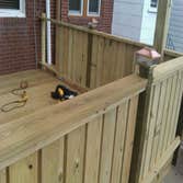 Photo(s) from Laur Moor Construction Two decks and a tiled kitchen floor