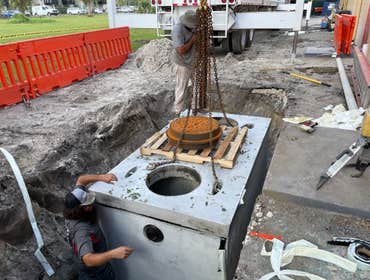 Restaurant build-out Installation of a 750 gal grease trap.