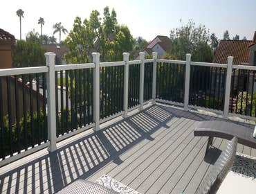 Photos by New Millennium Construction Services Inc #5 Demo existing 2nd story deck that was collapsing. Re-built 350 square foot deck using lumber, Tr