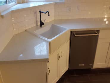 Budget kitchen remodel Budget Remodel That included demo work, some sheetrock, minor electrical, new tile flooring, new cabinets, counter top and subwa