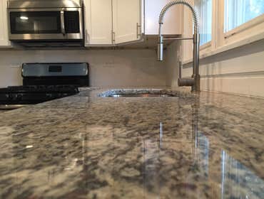 Granite and Modern Faucet
