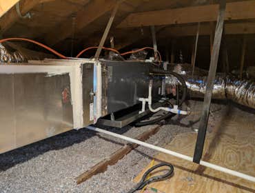 Photos by Truficient Energy Solutions #2 2 ton Mitsubishi Mini split system with insulation