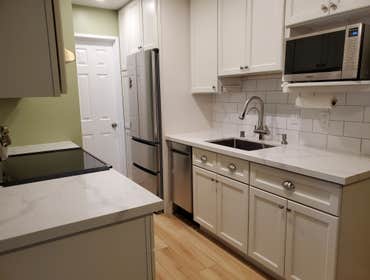 Kitchen Remodel This kitchen showcases a stunning transformation. We've revamped this space with upgraded plumbing and electrical, installed beautiful 