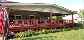 Photos by Petitti Painting LLC #2 Power washed and repainted this beautiful deck with a solid color deck stain