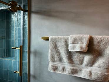 Photos by Ark Concept & Construction Inc #1 Residential bathroom remodel combining the timeless appeal of classic high-end materials with the raw, unfi