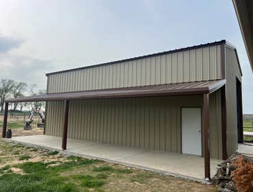 Photos by Paddco LLC #3 25’x45’ metal shop with lean-to 10’x45’, two 10’x14’ roll up doors and one walk-in door.
Framework built using 8” I beams and 8