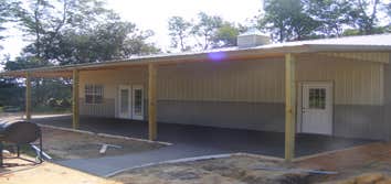 Cooper Job 26' x 48' Pole builing with (2) 12' x 48' lean-tos. Used for garage and pool house.