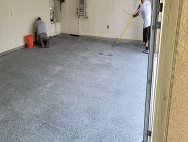 Photos by Jp Painting #1 Three car garage epoxy flake with urethane top coat. Filled all the cracks for a seamless floor.