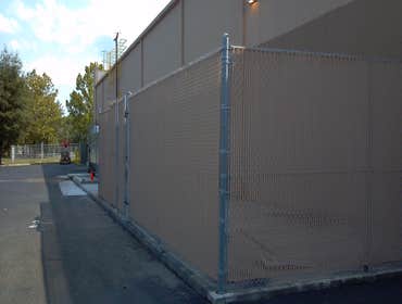 Sams Busch Drive 090311 New chain-link and PVT slats