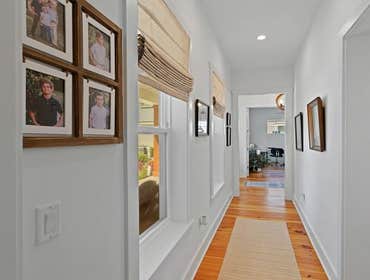 Bells River Residence Nestled in the serene Waterman’s Bluff in Yulee, FL, this exquisite home offers 3,046 sq ft of living space, expanding to a total