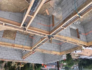 Mount Washinton Hillside land development including caissons/piles, grade beams, CMU block walls, retaining walls. All known as foundation and structur