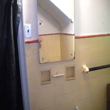 Bathroom remodel Complete tear down and build up of a bathroom including installation of a custom 7 foot shower stall with double shower heads